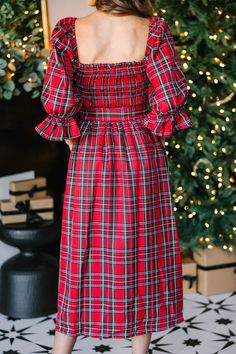 All I want for you is to be able to check out this adorable midi dress! It's so feminine and that tartan plaid print is absolutely perfect for the holiday season! This midi dress is going to look so good with heels or booties for any holiday party! Square neckline Smocked bust 3/4 sleeves with elastic cuffs Tied sash waist Plaid print No stretch however the smocking extends the bust *Plaid Colors: red, blue, hunter green, yellow, white. Baileigh is wearing the small. Red And Green Christmas Family Pictures, Red Tartan Dress, Holiday Fits, Tartan Plaid Dress, Dresses Church, Red Christmas Dress, Christmas Dress Women, Tassels Fashion, Crochet Clothing