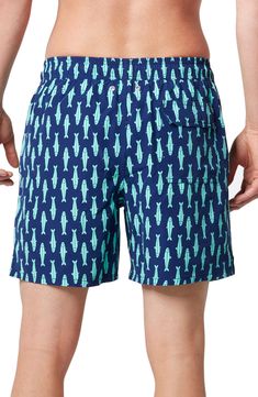 Sardines swim across quick-drying swim trunks designed with a chlorine- and salt-resistant finish so they're wearable at the pool or beach. Elastic/drawstring waist Side-seam pockets; back hook-and-loop flap pocket UPF 50+ sun protection Mesh liner 100% polyester Machine wash, line dry Imported Kids' Wear Green Cotton Shorts For Pool, Blue Swimwear With Drawstring For Vacation, Blue Drawstring Swimwear For Vacation, Navy Go-dry Bottoms For Summer, Moisture-wicking Blue Swimwear For Beach Season, Blue Moisture-wicking Swimwear For Beach Season, Blue Moisture-wicking Swimwear, Cotton Swim Trunks With Upf 50+ For Vacation, Blue Swim Trunks With Built-in Shorts For Pool