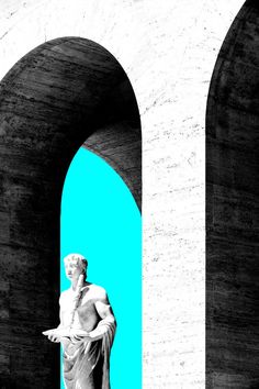 an image of a statue that is in the middle of two arches with blue sky behind it