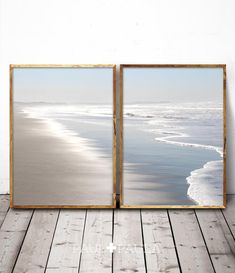 an open window showing the beach and ocean from inside, with wood planks on the floor