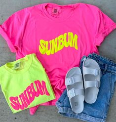 Limited Edition Sunbum Puff Tees – Vitamin Sea Boutique LLC Casual Neon T-shirt With Screen Print, Neon Summer T-shirt With Graphic Print, Neon Graphic Print Top For Summer, Neon Graphic Print T-shirt For Summer, Neon T-shirt With Graphic Print For Summer, Neon Tops With Graphic Print For Summer, Neon Graphic Print Top For Streetwear, Neon Casual T-shirt With Screen Print, Casual Neon Tops With Letter Print