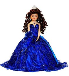 the doll is wearing a blue dress and tiara