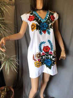 Gorgeous embroidered dress. Vibrant colours and comfortable woven cotton fabric. Excellent vintage condition Measurements Pit to pit 20”Length 35” 1950s Dress, Star Dress, Novelty Print, Vibrant Colours, Woven Cotton, Vintage Cotton, Embroidered Dress, Vintage Boho, Dress Clothes For Women