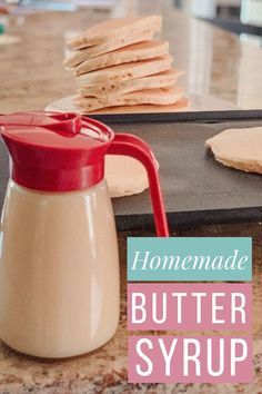 homemade butter syrup is on the counter next to some crackers and pita bread