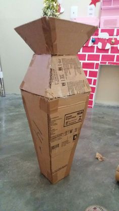 an open cardboard box sitting on the floor