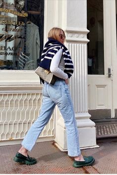 woman wearing green platform loafers, light wash jeans, and a long sleeve top with a striped navy sweater over her shoulders Holiday Wishlist, Platform Loafers, Styling Ideas, Stuff To Do, Loafers, Style Inspiration