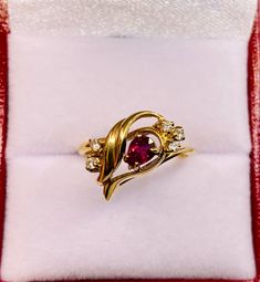 Beautiful Vintage 14k Gold Natural Pear Shaped Ruby and  Diamonds Ring 100%  Natural Ruby and Diamonds Beautiful genuine Ruby Ruby:                                            0.50 CT Diamond(s)                                 0.12 CT Color:                                                    G Clarity:                                                SI2 Total ring weight:                        2.6 GR 14K Yellow Gold Ring sizing available Free of Charge For more information regarding this item fee 14k Yellow Gold Pear-shaped Birthstone Ring, Pear-shaped 14k Yellow Gold Birthstone Ring, Elegant Pear-shaped Yellow Gold Birthstone Ring, Pear-shaped Yellow Gold Birthstone Ring, Fine Jewelry Pear-shaped Yellow Gold Birthstone Ring, Yellow Gold Pear-shaped Birthstone Ring, Fine Jewelry 14k Gold Pear-shaped Ruby Ring, 14k Gold Pear-shaped Ruby Ring, Elegant Yellow Gold Pear-shaped Birthstone Ring