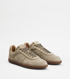 Man BEIGE Tod's Tabs Sneakers in Suede XXM68C0DP30RE07MC405 | Tods Lace-up Suede Sneakers With Embossed Logo, Suede Sneakers With Embossed Logo, Suede Sneakers With Embossed Logo And Round Toe, Classic Suede Sneakers With Stitched Sole, Classic Suede Sneakers With Leather Sole, Trainers Shoes, Performance Fabric, Shoes Trainers, Men's Sneakers