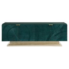 an art deco sideboard with green marble and brass accents, on a white background