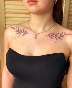 a woman with a tattoo on her chest