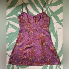 Nwt Urban Outfitters Purple Floral Mini Dress Sz Medium Adjustable Straps Side Zipper Approximately 15.25” Ptp 30” Long (Top Of Strap To Bottom Hem) Excellent Condition Urban Outfitters Dress, Floral Mini Dress, Purple Floral, Long Tops, Color Purple, Side Zipper, Urban Outfitters, Adjustable Straps, Diamonds