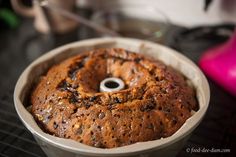 a bundt cake sitting in a pan on top of a table