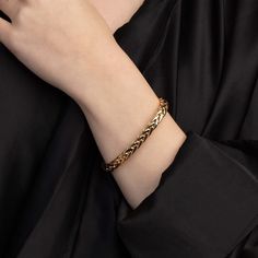 The Woven Collection is effortless and elegant, inspired by the craft of local artisans, and designed to be pure, simple, and wearable. This bold gold bracelet classic measures 6.5mm in thickness and is perfect for layering with our other woven bracelets. Made in ItalyMetal: 14K GoldLength: 7.5"Closure: Box Clasp Classic Gold Braided Bracelet For Formal Occasions, Elegant Everyday Cuban Link Bracelet, Elegant Yellow Gold Braided Jubilee Bracelet, Elegant Yellow Gold Jubilee Braided Bracelet, Classic Gold Bracelets With Wheat Chain, Classic Wheat Chain Bracelet As Gift, Classic Wheat Chain Bracelet For Gift, Elegant Gold Bracelet With Wheat Chain As A Gift, Elegant Braided Bangle Bracelet