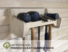 there is a rack that has some tools on it with the words french cleat hammer rack