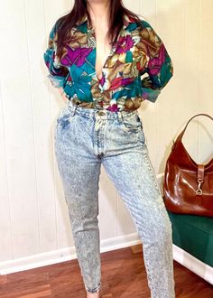 "Hello vintage lovers, thanks for stopping by! Up for sale we have another amazing & iconic pair of UNWORN 1980's vintage high waisted acid washed jeans! These are so adorable, with their high waist, tapered legs and Oh SO cute bow detail on the ankle. Excellent vintage condition with tags still attached! Snap these up before they get away! Tagged vintage size 16. Waist up to 30\", hips up to 39\". Inseam 28 Please contact us with any questions!" Acid Washed Jeans, High Wasted Jeans, Vintage Lovers, Acid Wash Jeans, High Waisted Mom Jeans, Hip Ups, High Waisted Jeans, Vintage Lover, 1980s Vintage