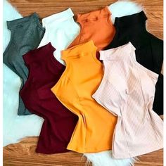 Blusa cropped regata feminina. Decote frente única com gola alta. Possui bojo. Manga regata. Tecido leve e com stretch. Obs: Peça com tamanho único que veste do Manequim 36 ao 44. Atenção: Cores e estampas variadas, sendo enviadas aleatoriamente.  Composição: 96% Viscose. 4% Elastano. Crop Top Outfits, Sweater Outfits, Peplum Top, Girl Fashion, Cool Outfits, Fashion Blogger, Two Piece Skirt Set, Girl Outfits