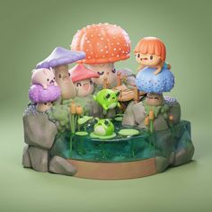 a group of figurines sitting on top of a pond