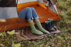 Made with our unique blend of low-impact recycled cotton and premium slub yarns, these Ragg Socks bring incredible comfort with an outdoorsy look. Perfect for hiking in the woods, relaxing around a campfire or even just snuggling on the couch, these socks will be your foot's new BFF. Reinforced Heel & Toe for Durability Specialty Arch-Support to Hug your Feet True Rib-Knit for the Ultimate Comfort & Fit Cozy, durable, mid-weight socks made in the USA from recycled materials Colors in this sock: Solmate Socks, Cabin Socks, Recycled Yarn, Hug You, Shirt Accessories, In The Woods, Campfire, American Made, Recycled Cotton