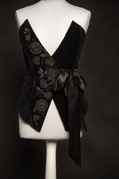 This exquisite corset  is made from cotton velvet and decorate with hand embroidery - Black on black. The front part is Black color cotton velvet  , the inside is black soft silk.    The corset is decorated with hand embroidery - impeccable silk threads, beads, sequins.   Corset is fixed around the waist on hooks and decorated with a beautiful bow. This belt will accentuate the waist and create a flattering feminine shape. On the waist 67-70 cm   Other dimensions per order. Add this fashionable Corset With Dress, Rpg Clothes, Modern Corset, Teresa Teng, Velvet Corset, Black On Black, Black Corset, Suspender Belt, Cabaret