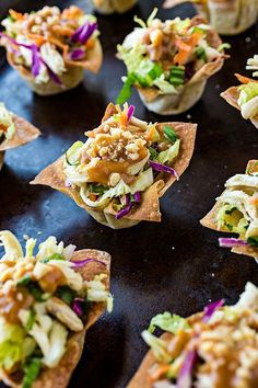 small appetizers are lined up on a baking sheet to be eaten for lunch