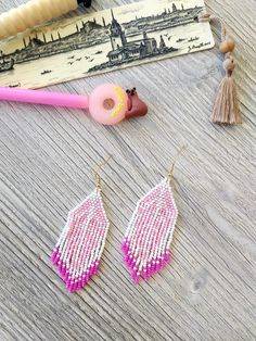 Cotton candy pink beaded fringe earrings seed bead earrings dangle boho earrings chandelier earrings native bead earrings colorful earrings bohemian ♥𝑇ℎ𝑒 𝑝𝑎𝑡𝑡𝑒𝑟𝑛 𝑜𝑓 𝑡ℎ𝑖𝑠 𝑒𝑎𝑟𝑟𝑖𝑛𝑔 𝑖𝑠 𝑖𝑛𝑠𝑝𝑖𝑟𝑒𝑑 𝑏𝑦 𝑡ℎ𝑒 𝑙𝑒𝑎𝑣𝑒𝑠 𝑜𝑓 𝑡ℎ𝑒 𝑛𝑎𝑡𝑢𝑟𝑒 𝑎𝑛𝑑 𝑐𝑟𝑒𝑎𝑡𝑒𝑑 𝑏𝑦 𝐻𝑊𝐵𝑒𝑎𝑑𝐽𝑒𝑤𝑒𝑙𝑟𝑦. ♥𝑀𝑎𝑑𝑒 𝑢𝑠𝑖𝑛𝑔 𝑓𝑟𝑒𝑒ℎ𝑎𝑛𝑑 𝑏𝑒𝑎𝑑𝑖𝑛𝑔 𝑤𝑜𝑣𝑒𝑛 𝑡𝑒𝑐ℎ𝑛𝑖𝑞𝑢𝑒𝑠 𝑤𝑖𝑡ℎ 𝑠𝑡𝑟𝑜𝑛𝑔 𝑠𝑦𝑛𝑡ℎ𝑒𝑡𝑖𝑐 𝑡ℎ𝑟𝑒𝑎𝑑. ♥𝑇ℎ𝑒 𝑠𝑖𝑧𝑒 𝑜𝑓 𝑡ℎ𝑒 𝑠𝑒𝑒𝑑 𝑏𝑒? Pink Bohemian Beaded Earrings, Pink Beaded Tassel Drop Earrings, Pink Tassel Drop Beaded Earrings, Bohemian Pink Beaded Earrings With Tiny Beads, Pink Beaded Tassel Earrings For Summer, Pink Tassel Beaded Earrings For Summer, Summer Pink Beaded Tassel Earrings, Pink Tiny Beads Beaded Earrings For Summer, Pink Beaded Earrings With Tiny Beads For Summer