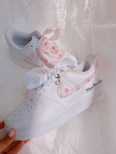 Be the trendsetter at your wedding with these custom white and pink pearl Air Force 1s! Show off your daring style and make a statement with these show-stopping shoes. Take risks and look stunning! 🔥 100% genuine, Brand New.👟 Custom sneakers.★Every pair is hand-made and unique.✨Best quality waterproof and scratch-proof paints used.🎉 1000+ satisfied customers across various platforms.🎁 Treat the shoes as art as they are delicate and special.💌 We accept custom orders. Kindly drop a message fo Pink Lace-up Wedding Shoes, Customizable White Sneakers For Party, Lace-up Pink Wedding Shoes, Elegant White Sneakers For Bridal Shower, Air Force 1 Wedding, Bride Sneakers Wedding, Sneaker Wedding, Sneakers Wedding, Bride Sneakers