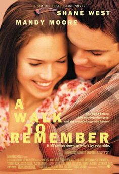 a walk to remember movie poster with a young man and woman embracing each other's shoulders