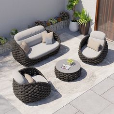 an outdoor seating area with couches and tables