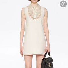 **Will Be Poshmark Authenticated** Gorgeous Shift Dress By Miu Miu. Eyelet Trim Sleeveless With Peter Pan Collar Concealed Zip Closure At Side Length: 34.75" Hip: 35" Waist: 32" Bust: 34" Elegant Mini Dress With Lace Collar For Daywear, Chic A-line Dress With Lace Collar, Chic Evening Dress With Lace Collar, Spring Sleeveless Miu Miu Dresses, Miu Miu Sleeveless Spring Dresses, Sleeveless Miu Miu Spring Dresses, Elegant Mini Dress With Lace Collar For Spring, Elegant Mini Dress With Lace Collar For Formal Events, Fitted Dress With Lace Collar For Work