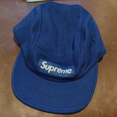 Supreme Wool Camp Cap Nwt Blue Blue Flat Brim Baseball Cap With Logo Patch, Blue Snapback Hat With Logo Patch, Blue Snapback Hat With Logo Patch For Sports, Blue 5-panel Baseball Cap With Logo Patch, Blue Baseball Cap With Logo Patch And Flat Brim, Blue Baseball Cap With Curved Brim And Embroidered Logo, Casual Blue Baseball Cap With Logo Patch, Blue Snapback Hat With Logo Patch And Curved Brim, Blue Curved Brim Hat With Logo Patch