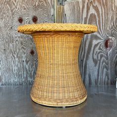 a wicker basket sitting on top of a table