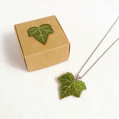 This ivy leaf necklace is part of my ivy jewelry collection and botanical jewelry creations. A real leaf necklace that will suit your personal style. Woodland jewelry and forest necklaces are something very elegant and spiritual. So you won't be disappointed at all by this unique jewel made for you. 🌱 It is truly a very special gift for any occasion! 🌿🌿 I wish you could always wear this little piece of nature close to your heart...💙 About the IVY LEAF Hedera, commonly ivy, is a perennial pla Nature-inspired Leaf Jewelry Gift, Botanical Leaf Shaped Jewelry For Gifts, Botanical Leaf-shaped Jewelry For Gifts, Handmade Leaf-shaped Necklace Gift, Handmade Leaf-shaped Necklace For Gifts, Botanical Leaf-shaped Jewelry Gift, Handmade Leaf Shaped Necklace For Gift, Handmade Leaf Necklace For Gift, Green Leaf-shaped Necklace For Gift