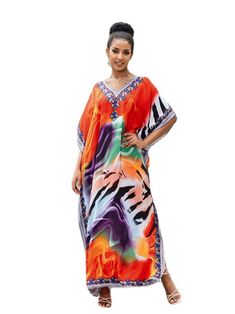 The Sound of Love Women's Rayon Multicolor Kaftan Dress is a vibrant and eye-catching garment that celebrates color and comfort. Crafted from high-quality rayon fabric. this dress offers a soft and lightweight feel. ensuring all-day comfort.Featuring a beautiful multicolor design. this kaftan dress is a visual delight. The combination of vivid hues and intricate patterns creates a lively and playful aesthetic. The vibrant colors reflect a sense of joy and positivity. making it a perfect choice f Multicolor Flowy V-neck Kaftan, Multicolor V-neck Kaftan For Vacation, Red Abstract Print Maxi Dress For Summer, Red Abstract Print Summer Maxi Dress, Multicolor V-neck Maxi Dress For Festivals, Summer Red Maxi Dress With Abstract Print, Vibrant Multicolor V-neck Dress, Colorful Printed Vibrant Dresses, Vibrant V-neck Kaftan For Vacation