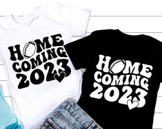 two t - shirts with the words home coming 2013 and baseball on them, sitting next to each other