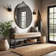 a room with a bench, mirror and shoes on the floor in front of it