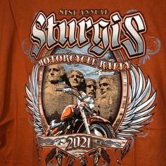 an orange shirt with the words stur's motorcycle rally on it and two heads