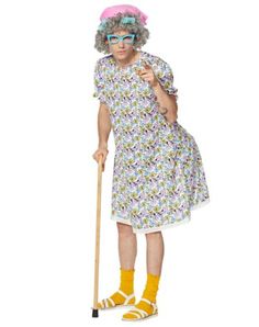 an old woman in a dress and yellow socks is holding a cane while posing for the camera