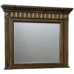 a wooden framed mirror on a white background