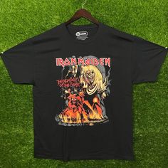 This Black "Iron Maiden The Number Of The Beast Soundtrack" T-Shirt From Urban Outfitters Is Size Xl. It Measures 23 Inches Pit To Pit And 31 Inches In Length, Perfect For All Hardcore Fans. Black Color Iron Maiden The Number Of The Beast Soundtrack Design Brand: Urban Outfitters Size: Xl Measures 23 Inches Pit To Pit Length: 31 Inches Size: Mens Xl Condition: New Without Tags Urban Outfitters Black Crew Neck T-shirt, Black Cotton T-shirt By Urban Outfitters, Urban Outfitters Grunge T-shirt For Streetwear, Urban Outfitters Black Cotton T-shirt, Urban Outfitters Grunge Short Sleeve Tops, Urban Outfitters Black Grunge Top, Urban Outfitters Graphic Tees, Urban Outfitters Shirts, Urban Outfitters Men