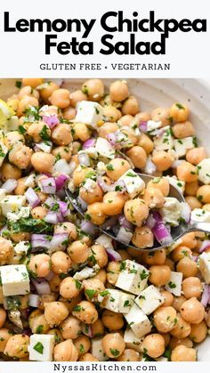 a white bowl filled with chickpea and feta salad