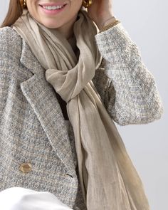 A lightweight natural scarf made of 100% linen. Features a solid pattern and finished with a tasseled edge. Approx 90" x 36" Lightweight fabric May be styled multiple ways Finished with tasseled edge Made with 100% Linen Dry clean Only Ships from San Antonio, TX Casual Linen Scarves For Summer, Chic Beige Shawl For Spring, Chic Solid Scarves For Spring, Casual Beige Shawl For Spring, San Antonio Tx, Dry Clean Only, Solid Pattern, Natural Linen, Scarf Shawl