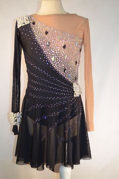 a dress with sequins and beads on it