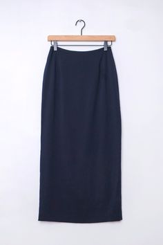 Channel your inner clean girl with this beautiful dark navy blue maxi skirt with discrete back zip closure. Back vent and two waist seams provide movement and shape to an otherwise straight cut skirt. Measurements*: Waist 25", Hips 36", Length 36" Brand: INC International Concepts Tag Size: 2 Fabric: 96% Polyester, 4% Spandex; Lining 100% Acetate * Measurements are taken flat. Bust and chest are taken from pit to pit. Length is taken from shoulder seam to bottom hem. Shoulders are taken from sho Classic Relaxed Maxi Skirt, Classic Full-length Lined Maxi Skirt, Classic Solid Color Lined Maxi Skirt, Classic Solid Maxi Skirt With Lining, Classic Full Length Lined Maxi Skirt, Classic Long Pencil Skirt In Solid Color, Elegant Blue Full Length Maxi Skirt, Long Pencil Skirt For Formal Occasions, Elegant Navy Skirt For Formal Occasions