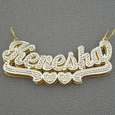 "*2 Inches Wide Personalized Solid 10K or 14K Gold Name Pendant 3D Double Plates Charm, fancy script unique font design, name and bottom heart design tail hand carved diamond accent in white tone Rhodium. *Average Name Pendant Dimension: 2 Inch (50 mm) X 3/4 Inch (19 mm) Approx. *Up to 9 Letters - Only first letter capitalized. *Thickness Top: 0.7 mm / 22 Gauge / 0.028\" Approx. *Thickness Bottom: 0.40 mm / 26 Gauges / 0.018\" Approx. *This solid gold 3D name pendant cut out by latest technology Custom Gold Nameplate Jewelry, Custom Gold Name Jewelry, Custom Gold Jewelry With Custom Name, Custom Gold Jewelry With Name, Custom Gold Jewelry For Personalized Gift, Gold Jewelry With Names For Formal Occasions, Gold Formal Jewelry With Names, Formal Gold Jewelry With Names, Gold Nameplate Jewelry With Names