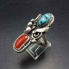 "VINTAGE NAVAJO TURQUOISE and CORAL RING by DAVID K LISTER DESCRIPTION: This ring will be a treasured addition to your collection of fine vintage Native American jewelry. MEASUREMENTS: Ring face measures 1 1/2\" x 5/8\" WEIGHT: 11.7 grams SIGNED: DKL, for David K Lister (Navajo) STERLING: unmarked, verified sterling silver" Southwestern Gemstone Rings For Collectors, Vintage Turquoise Multi-stone Rings, Southwestern Turquoise Ring, Jewelry Measurements, Vintage Native American Jewelry, Turquoise And Coral, Coral Ring, Navajo Turquoise, Vintage Navajo