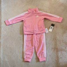 Adidas Baby Girls Tracksuit Size 18 Months. Pink And White In Color. Brand New! Adidas Pink Playwear Sets, Adidas Pink Long Sleeve Sets, Adidas Pink Sets For Spring, Pink Adidas Cotton Set, Adidas Pink Cotton Sets, Adidas Pink Spring Set, Pink Cotton Adidas Sets, Adidas Pink Fitted Sets, Fitted Pink Adidas Sets