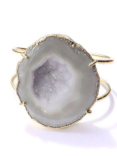 Soft white crystal geode cuff bracelet with gold hardware Adjustable Elegant Gold Geodes, Elegant Gold Geodes For Gift, Gold Agate Bangle, Gold Agate Bangle Jewelry, Gold Agate Jewelry For Wedding, Elegant Gold Geodes With Natural Stones, White Quartz Crystal, Crystal Geode, Agate Bracelet