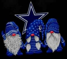 three gnomes are standing next to each other with a star on the back ground