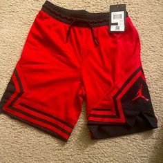 Red And Black Shorts. Michael Jordan Red Bottoms With Built-in Shorts For Streetwear, Red Streetwear Shorts, Red Short Bottoms For Streetwear, Red Short Length Bottoms For Streetwear, Red Cotton Athletic Shorts, Red Streetwear Bottoms With Built-in Shorts, Red Cotton Athletic Shorts With Built-in Shorts, Red Cotton Athletic Shorts For Streetwear, Red Cotton Athletic Shorts For Sports