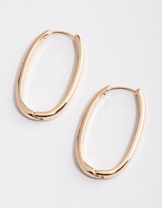 Style the latest jewellery trends with our collection of on-trend earrings from our Curated Collection! From a pair of gold and silver huggies, a set of simple studs to textured drop earrings - we have a pair of earrings for everyone. These hoop earrings feature a gorgeous gold setting and long oval design for a unique touch. | Lovisa Gold Long Skinny Oval Hoop Earrings Trendy Oval Hoop Earrings, Chic Oval Earrings For Everyday, Chic Oval Metal Jewelry, Trendy Oblong Jewelry, Trendy Oval Earrings For Everyday, Trendy Oval Everyday Earrings, Modern Tarnish Resistant Oblong Jewelry, Oval Single Earring For Everyday, Oblong Everyday Earrings For Pierced Ears